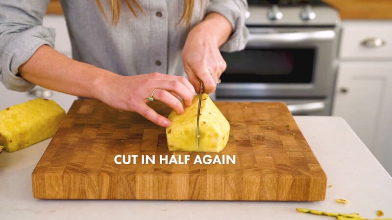 How to Cut a Pineapple | Cut in half again